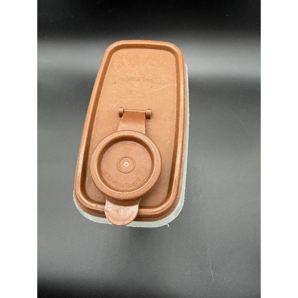 Vintage Mini Cereal Tupperware Container Bottom is 499-8 and‎ Top is 509-10.